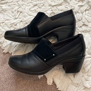 Clarks Black leather and suede size 5 a lock heel slip on.
